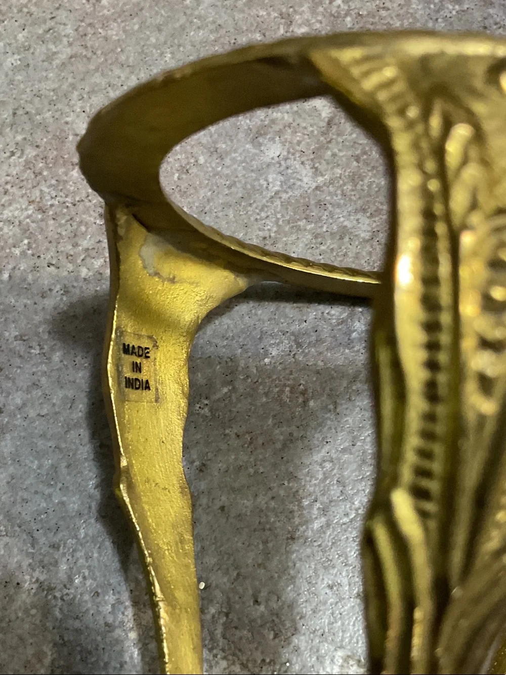 Brass candle holder with glass